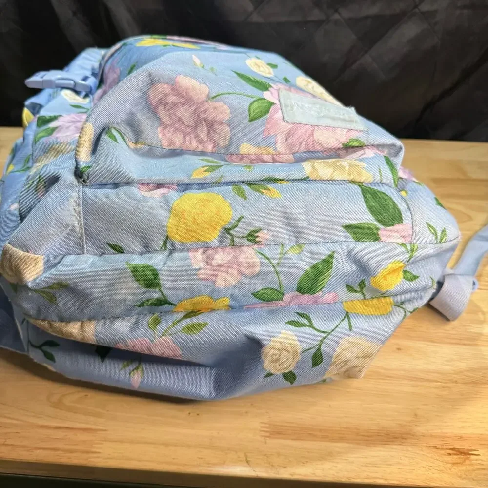 Jansport All Over Floral Print Backpack with Adjustable Straps and Zip Closure